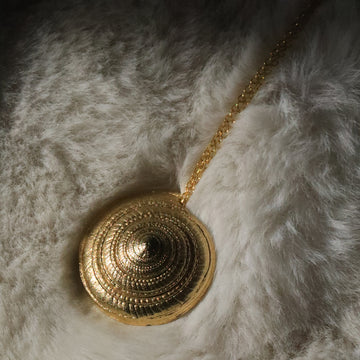 A Gold-Plated Shell Pendant