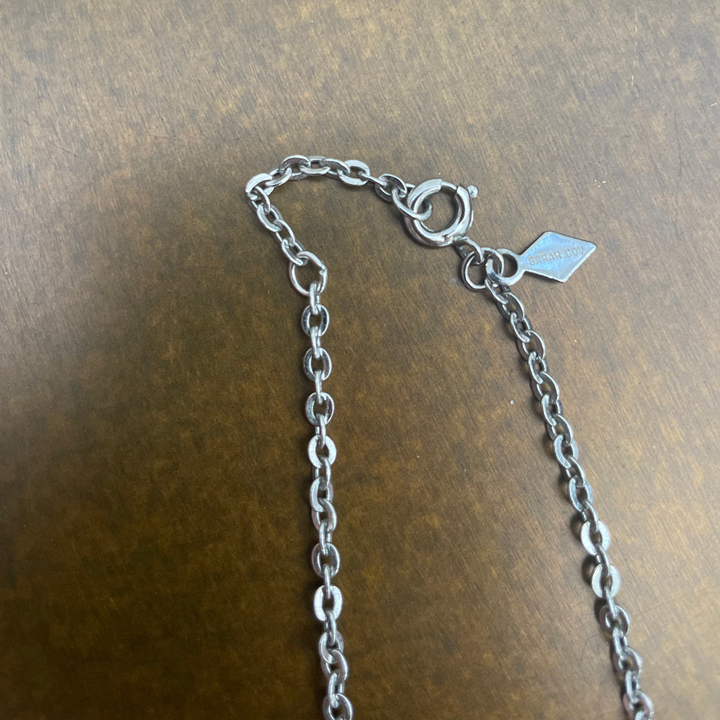 Vintage 1975 Sarah Coventry 'Pizzazz' Rhodium-Plated Choker Necklace with Blue Baguette